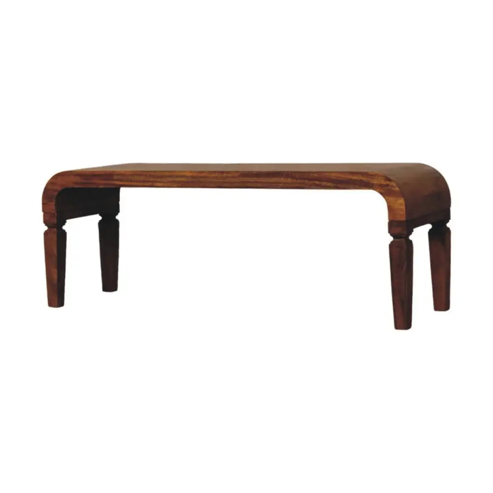 Arcus coffee table in dark brown solid mango wood with a sleek curved top and turned legs for stylish living rooms