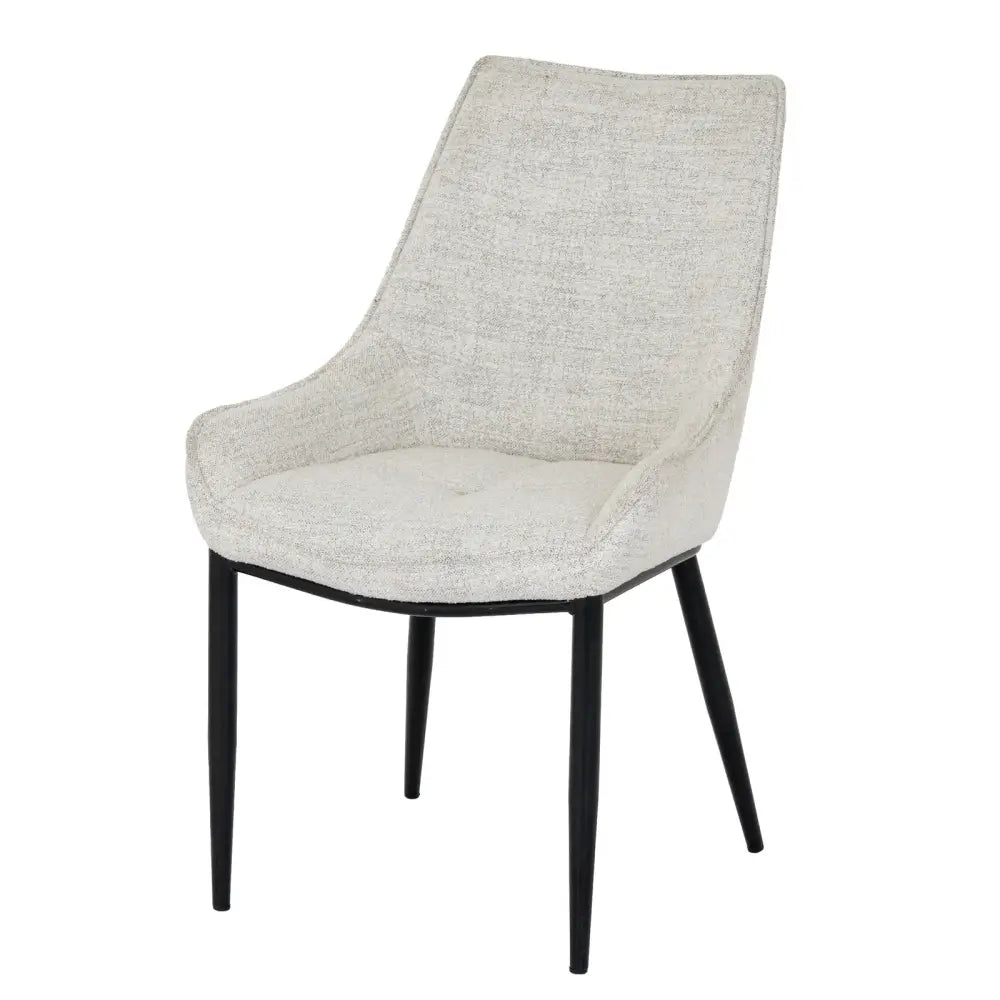 Modern zephra dining chair with textured beige fabric upholstery and sleek black metal legs for stylish dining seating