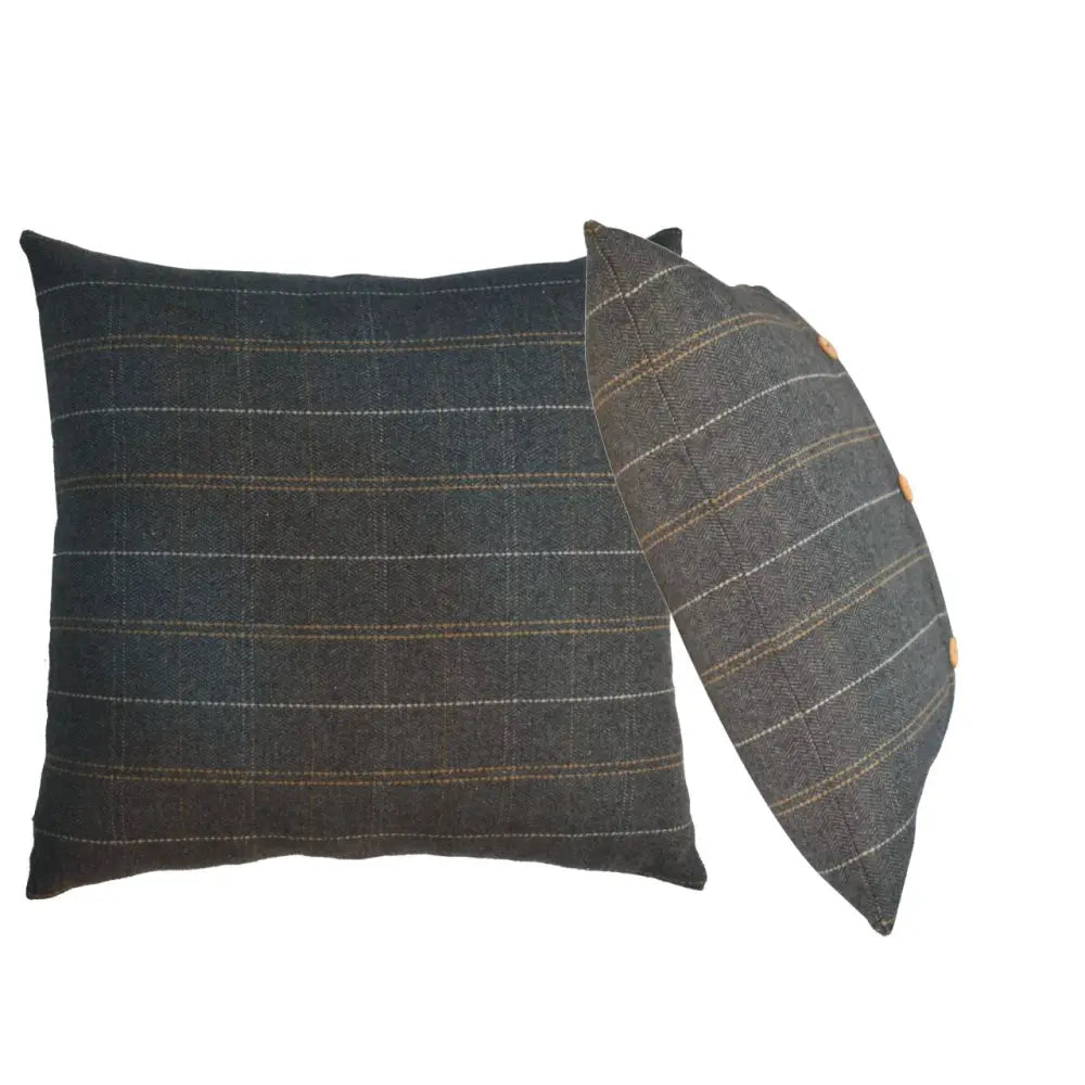 Dark gray plaid quinn pewter cushions with subtle tan and white stripes made from textured tweed fabric