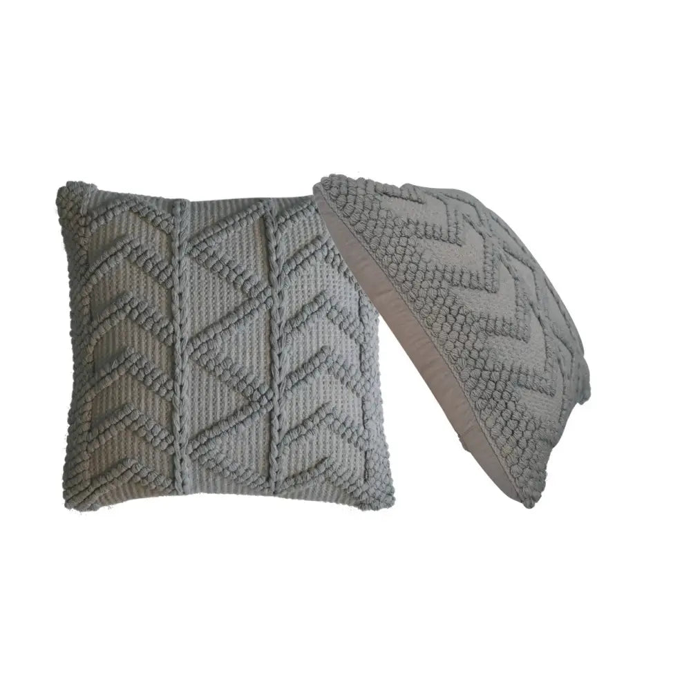Gray textured throw pillow with raised geometric knit pattern from the alda cushion set gray cushion set