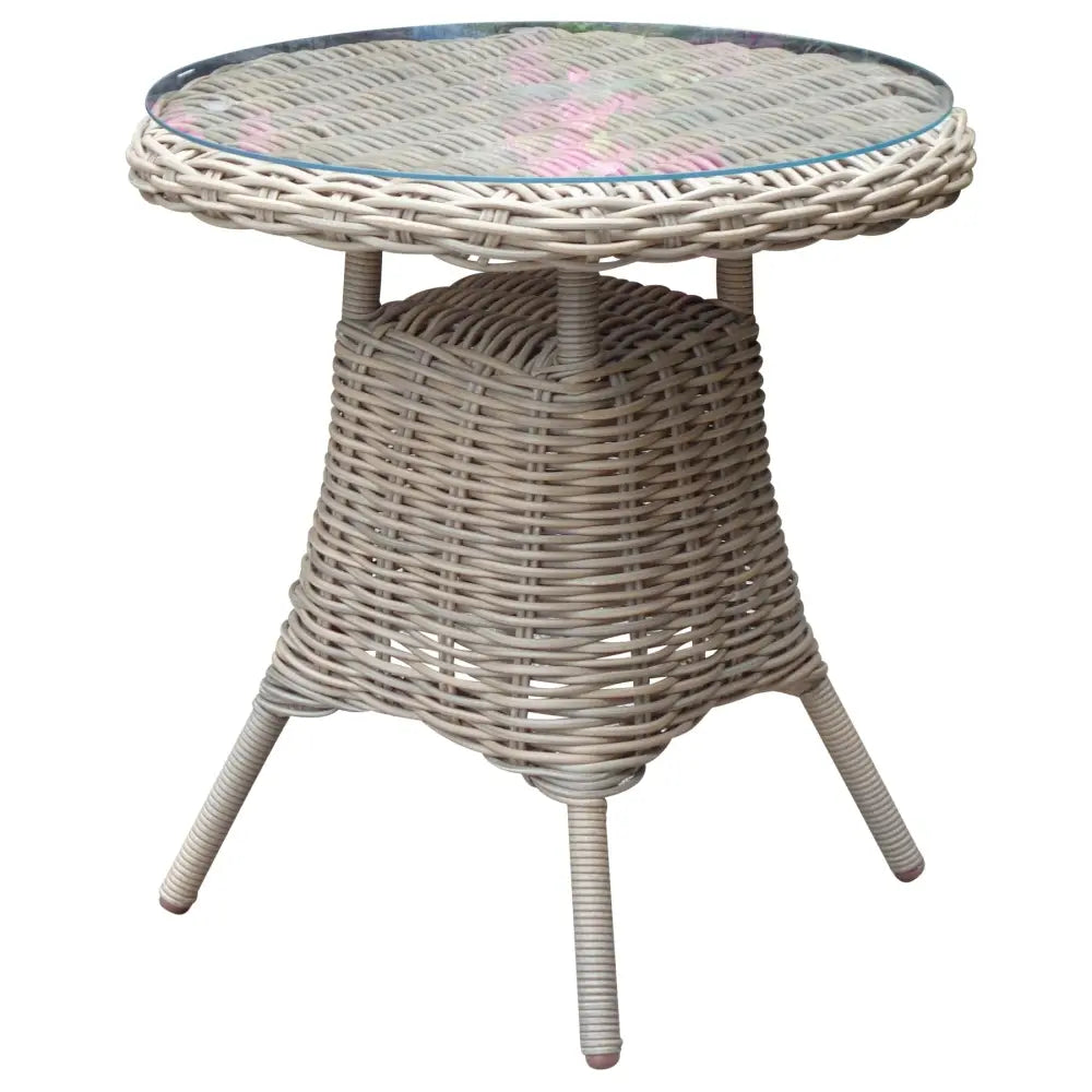 Beige wicker amalfi collection outdoor bistro table with clear glass top and subtle pink floral patterns