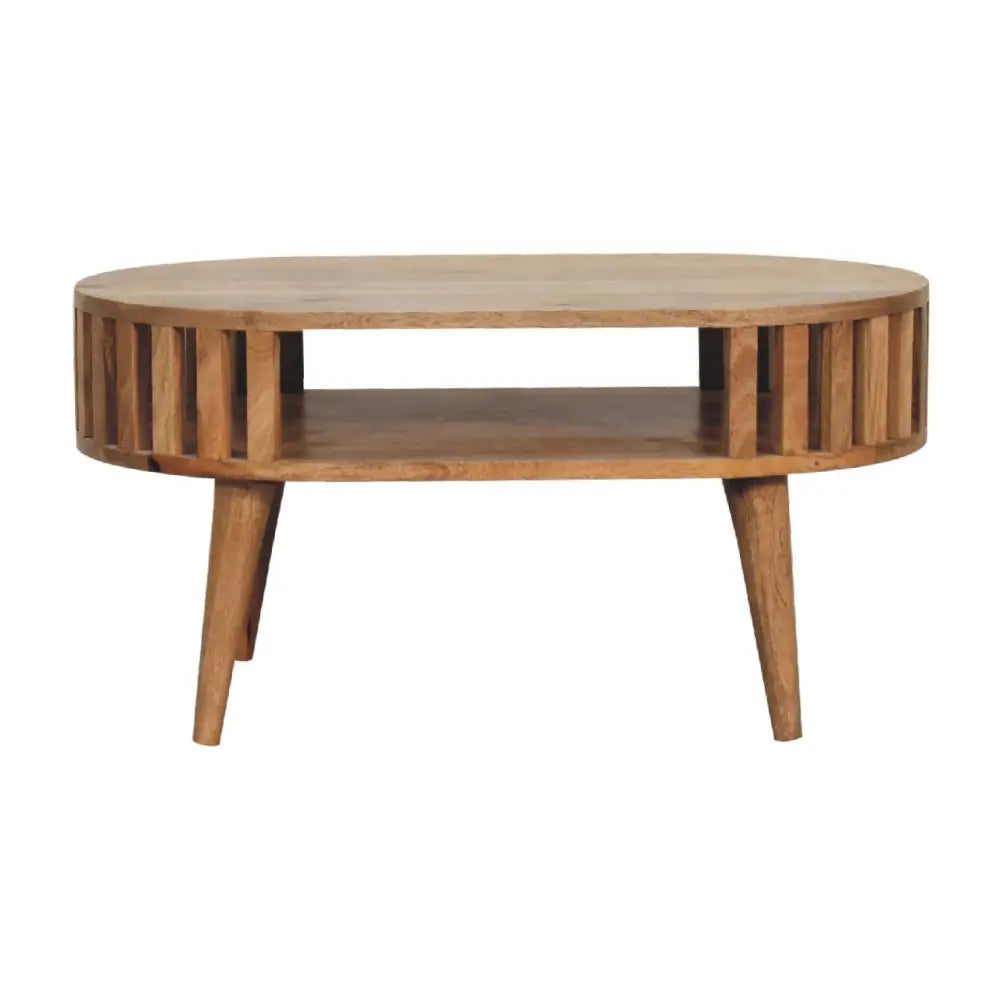 Ariella coffee table with light brown wood finish, vertical slats on sides, and tapered legs in mid-century modern style