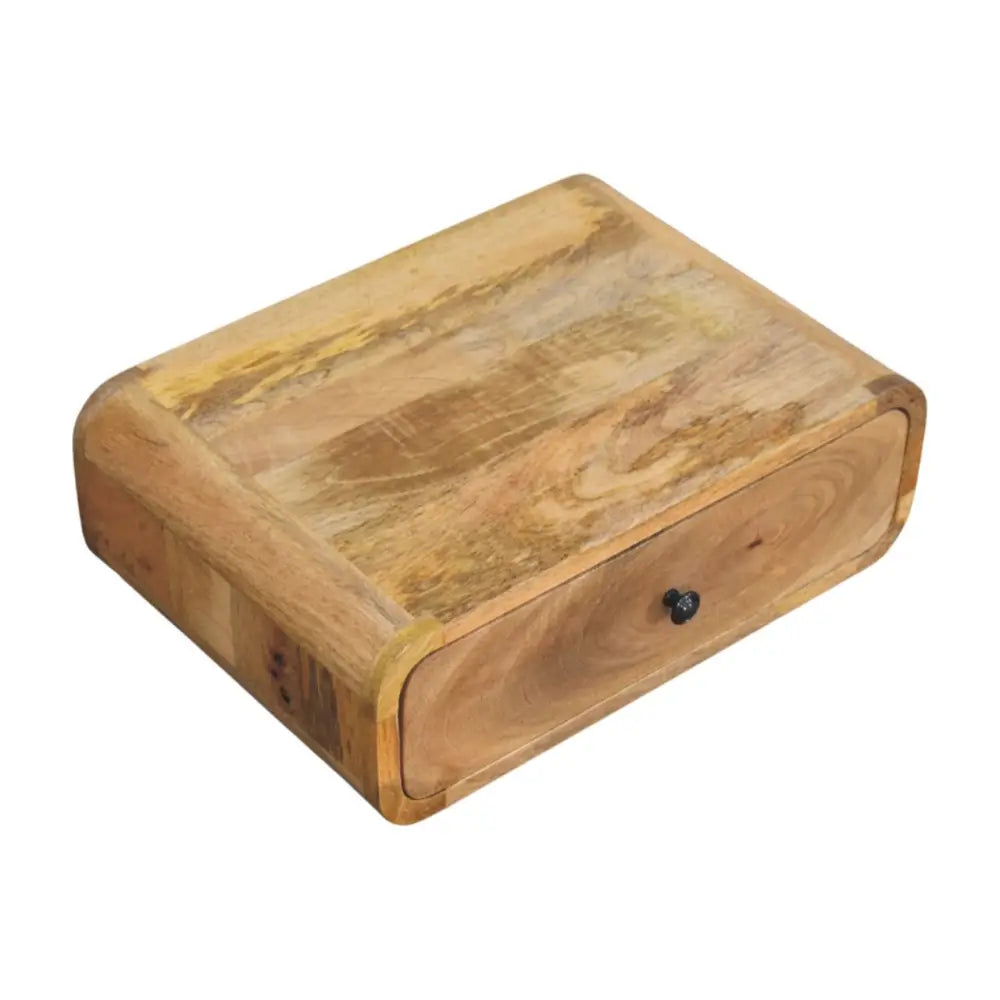 Avora wall-mounted nightstand with one drawer made of solid mango wood in natural light brown tones