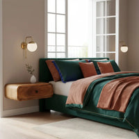 Avora wall-mounted oak-ish 1 drawer nightstand next to emerald green velvet bed with terracotta throw blanket made of solid mango wood