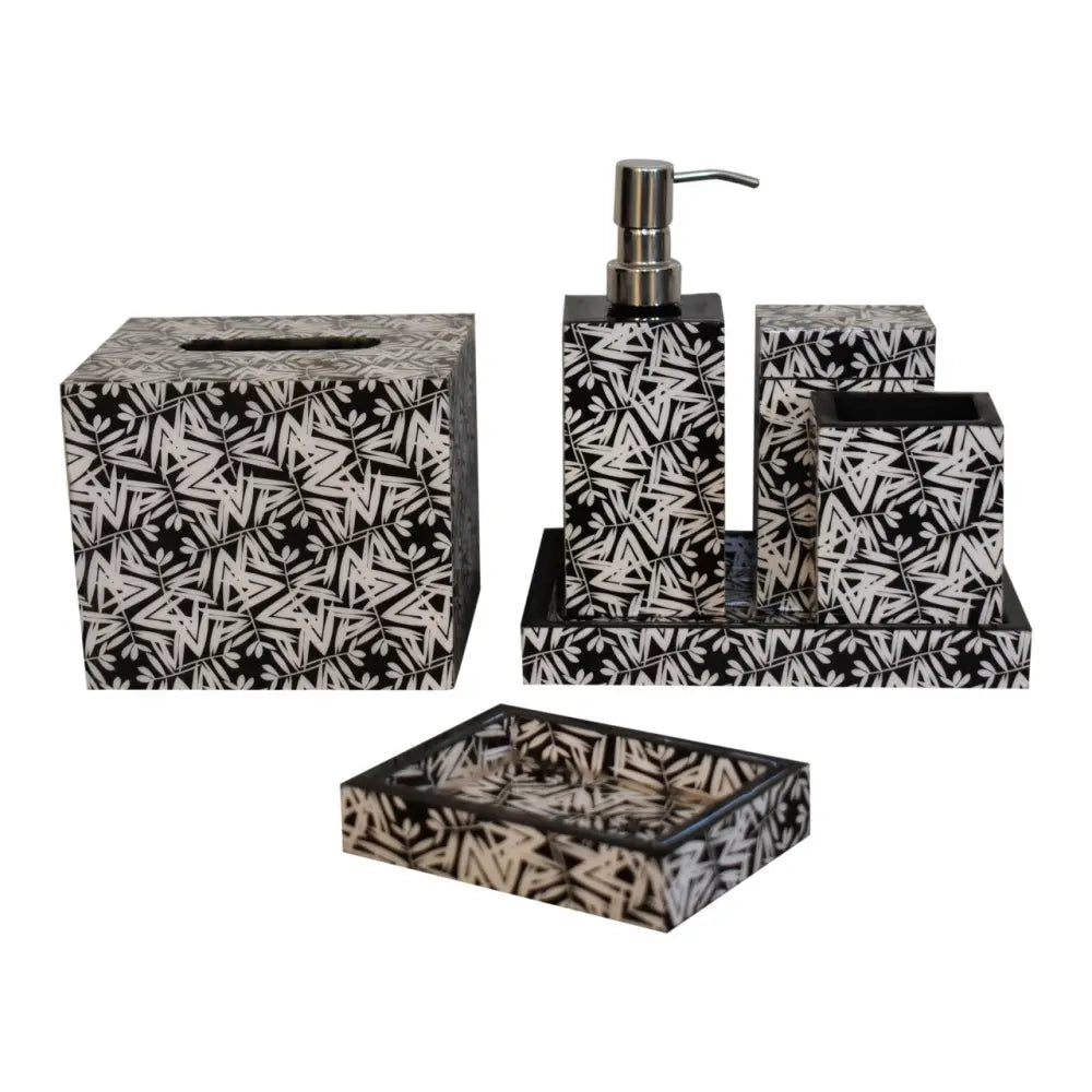 Black and white aztec print bathroom set featuring a geometric pattern and a metallic pump dispenser for daily use