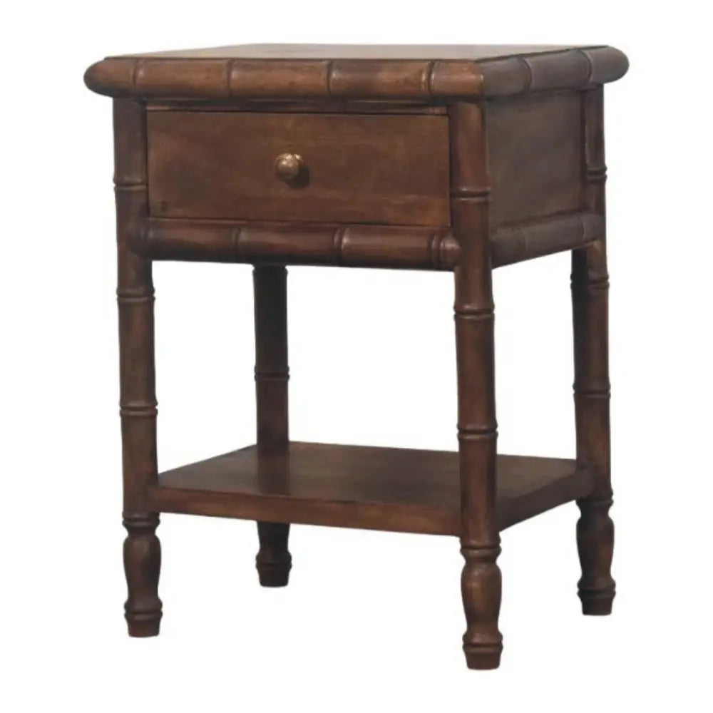 Dark brown bamboo carved bedside table with single drawer and lower shelf made of solid mango wood