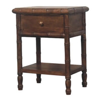 Dark brown bamboo carved bedside table with single drawer and lower shelf made of solid mango wood