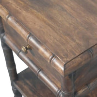 Dark brown bamboo carved bedside table with single drawer and brass knob made from solid mango wood