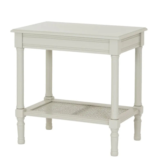 Off-white belmont rattan collection end table with cane-woven lower shelf and turned wooden legs