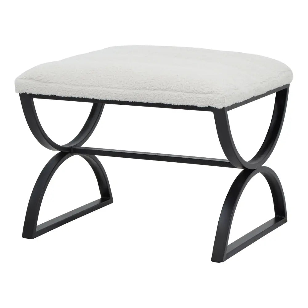 Boucle ribbed foot stool with black metal frame and plush white upholstered seat for stylish seating