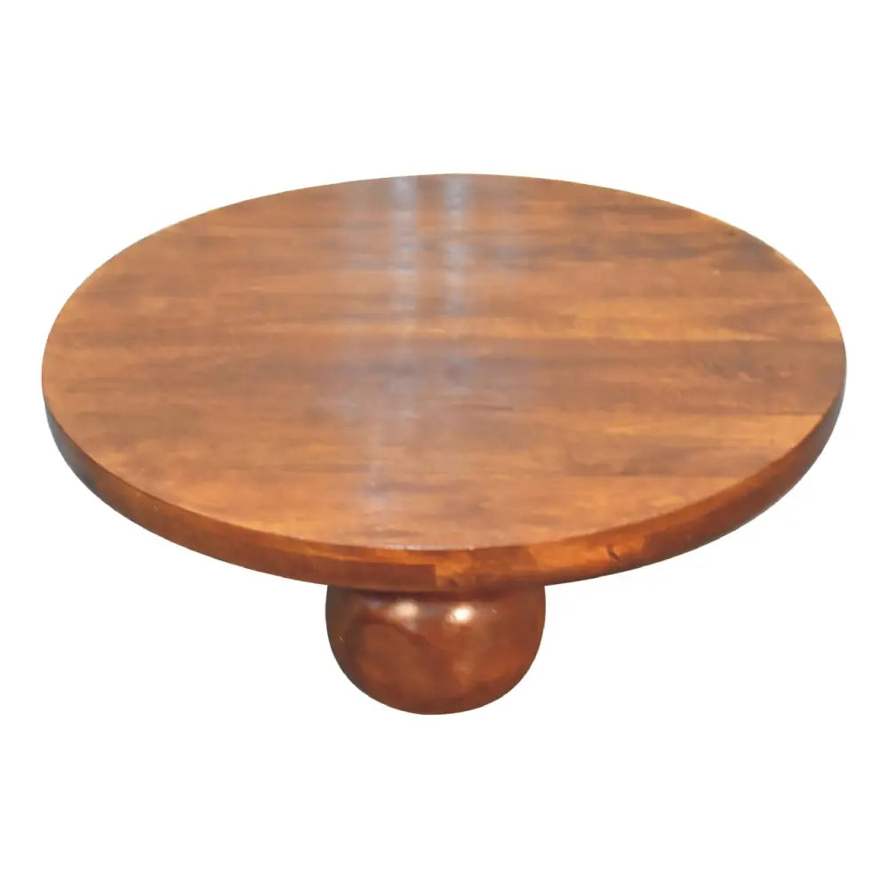Round wooden chestnut central ball table with smooth finish and single rounded pedestal base for cozy living spaces