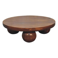 Round wooden chestnut central ball table with smooth brown finish and three spherical ball legs