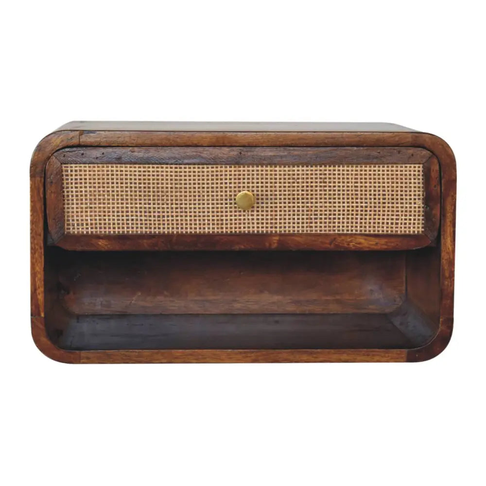 Chestnut wall mounted dark wood nightstand with single drawer featuring woven cane front and brass knob