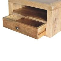 Chunky oak-ish floating bedside with light wood grain, single drawer, open shelf, and small round metal knob