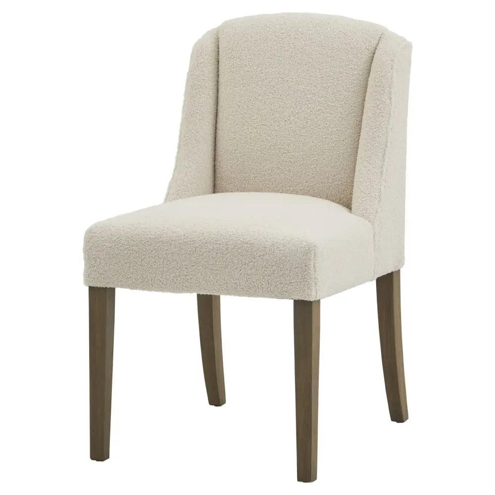 Beige compton boucle dining chair with plush textured fabric and dark wood legs for stylish dining seating