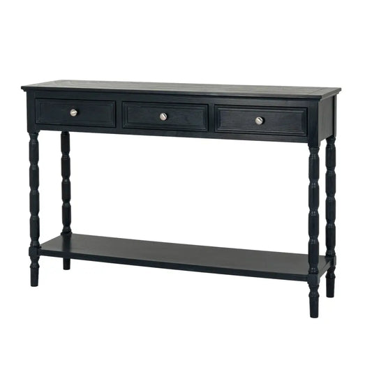 Black wooden drawer console from contour collection with three proportioned drawers and turned legs