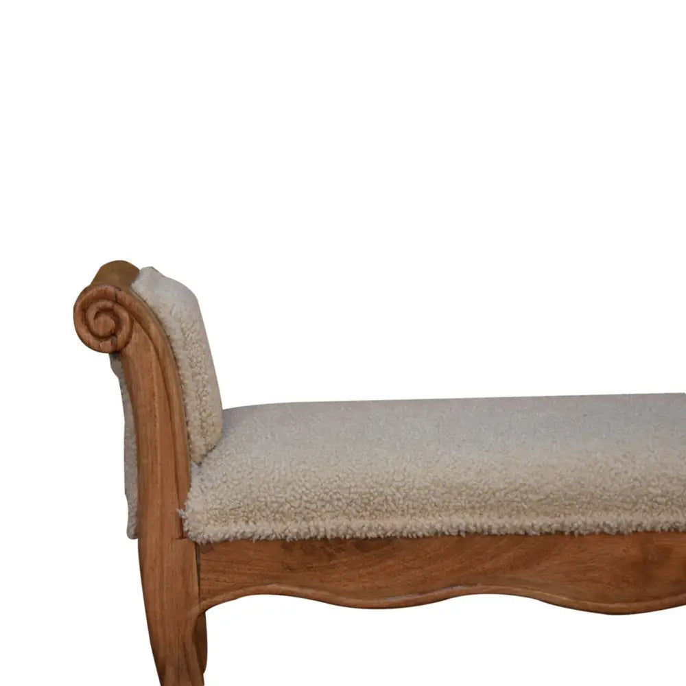 Cream boucle french style chaise lounge with cream-colored sheepskin upholstery and carved wooden frame