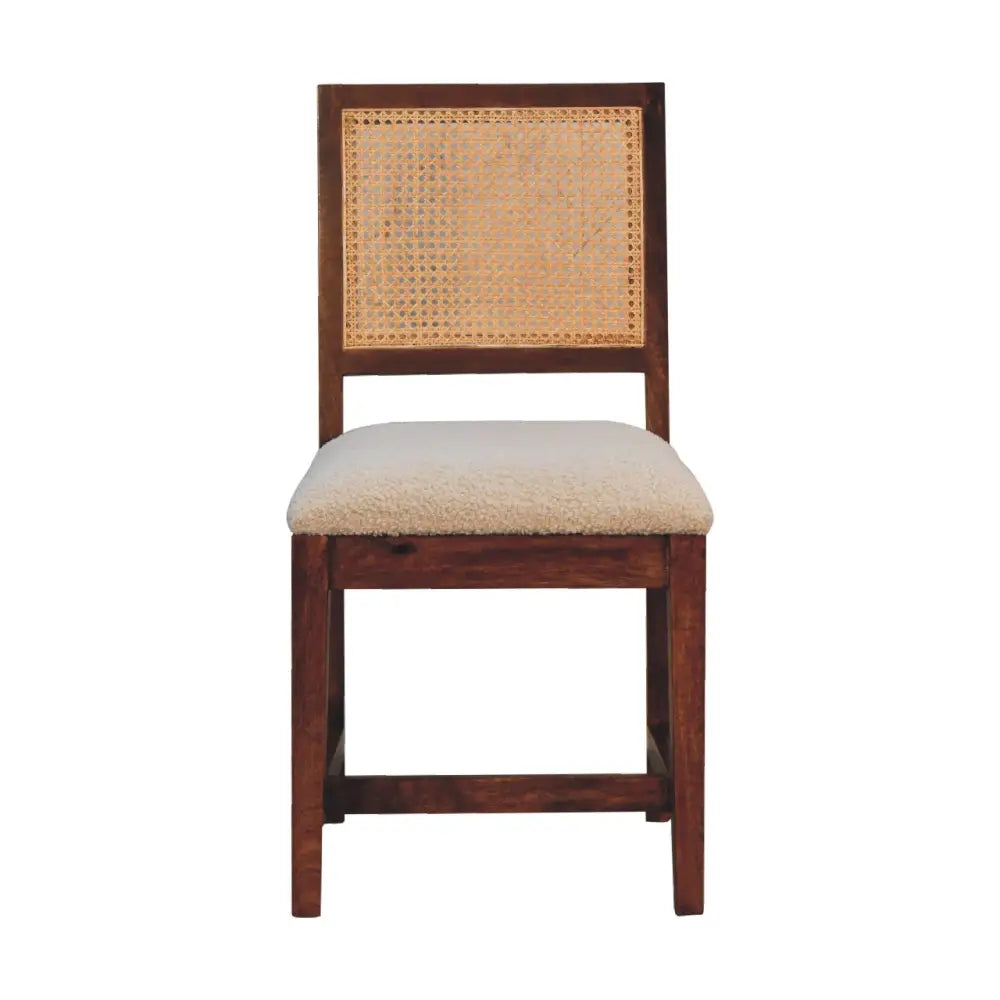 Rustic wooden cream boucle rattan chair with woven cane back and plush beige upholstered seat for dining