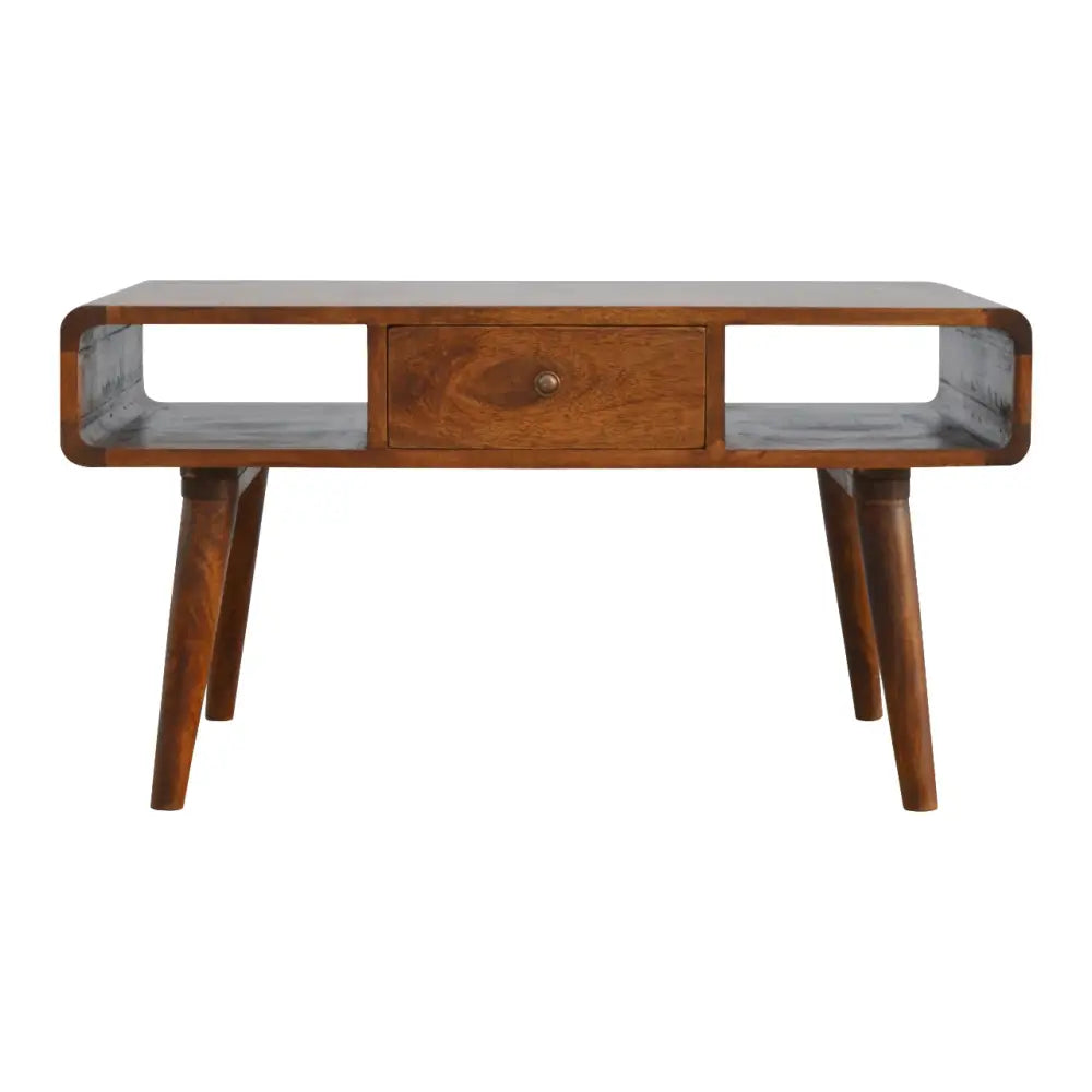Mid-century modern curved chestnut coffee table with tapered legs single drawer and open shelving in wood