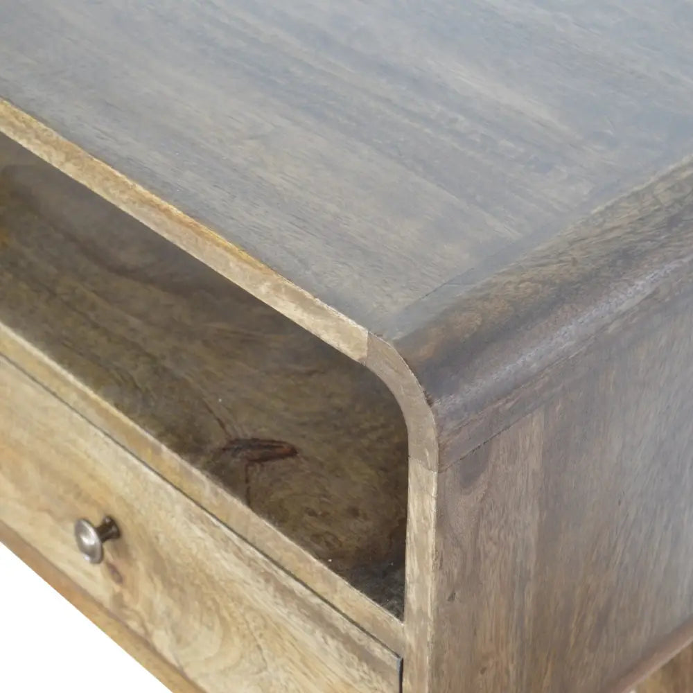 Curved grey wash wooden console table nightstand with single drawer and metallic knob in gray wash finish