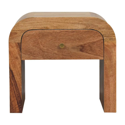 Curved wooden darcy bedside with a single drawer and opulent brass knob for stylish bedroom storage