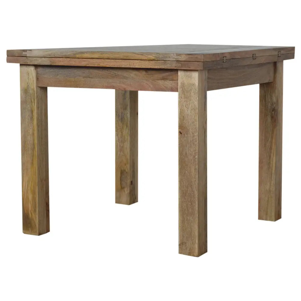 A sturdy dark wood extendable butterfly dining table with simple thick legs and a smooth rectangular surface