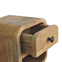Extra mini curved oak-ish bedside with light brown wood, black metal knob, and open slot for compact bedroom use