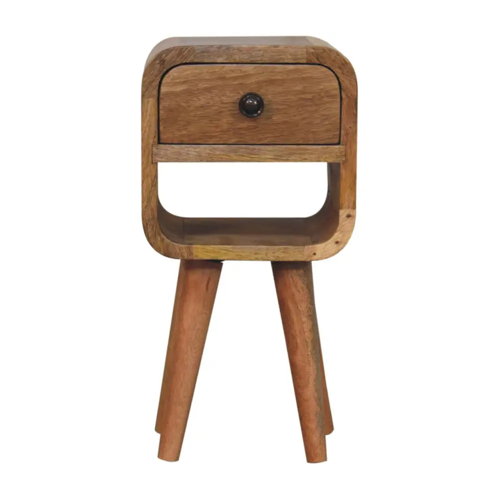 A rustic wooden extra mini curve lower bedside nightstand with a single drawer and black round knob