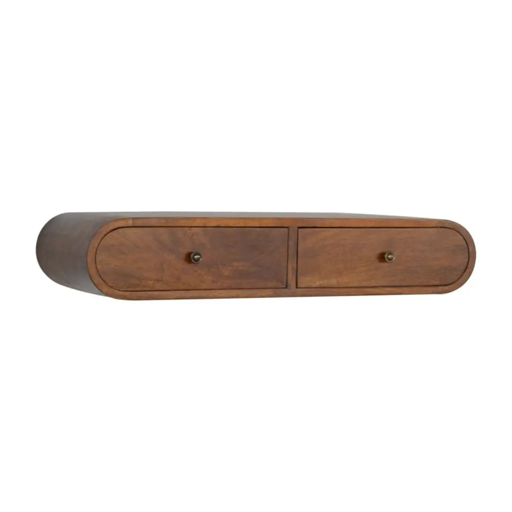 A sleek dark brown wooden floating chestnut london console with two oval drawers and brass knobs mounted on the wall