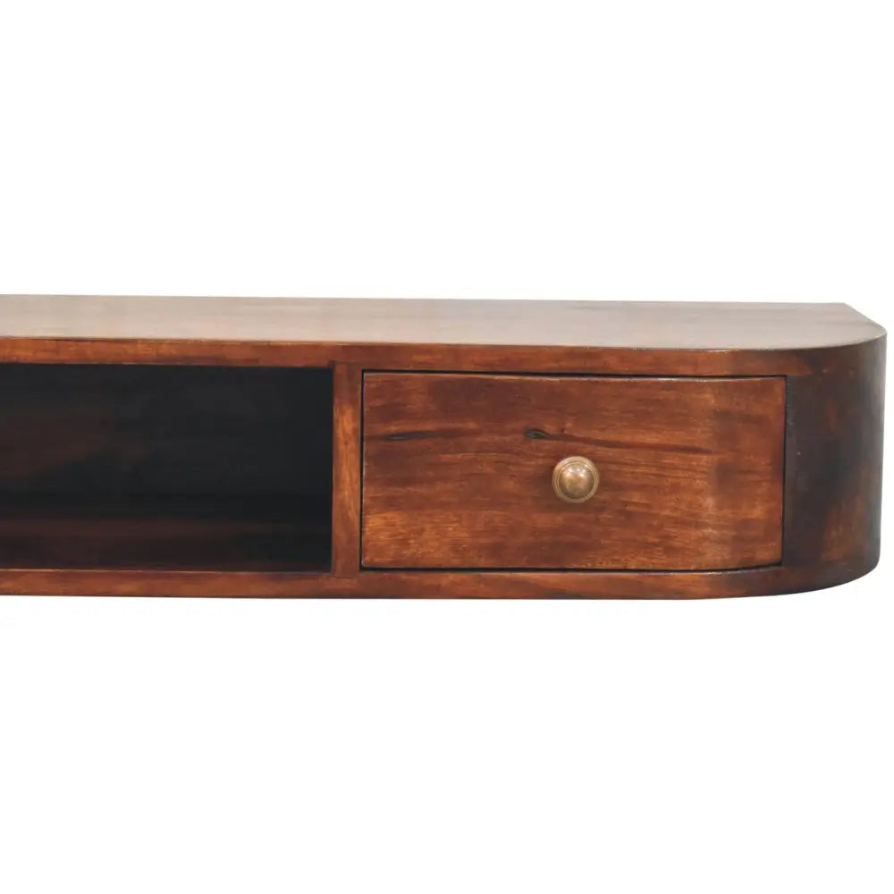 A rich dark brown wall mounted chestnut console with curved edge and single drawer with round brass knob