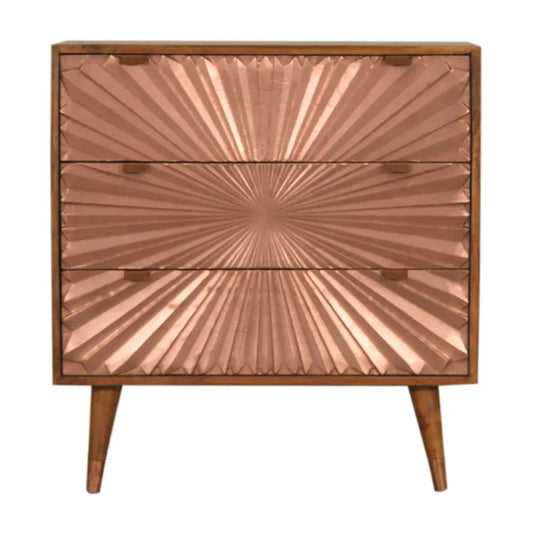 Copper finished three drawer chest with sunburst embossed panels and wooden legs called manila copper chest