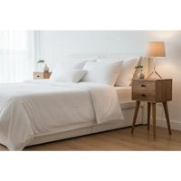 Minimalist oak bedside table with two drawers and tripod legs features two functional storage drawers in opulent furniture style