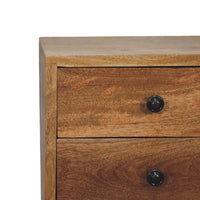 Rustic wooden bedside table featuring two drawers with sleek black round knobs in opulent oak finish
