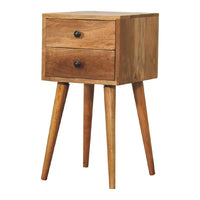 Minimalist bedside table with two drawers in warm oak wood finish featuring tapered legs for opulent furniture style