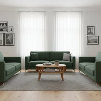 Dark green upholstered sofa with matching armchairs around a wooden mini ariella coffee table set up for living room use