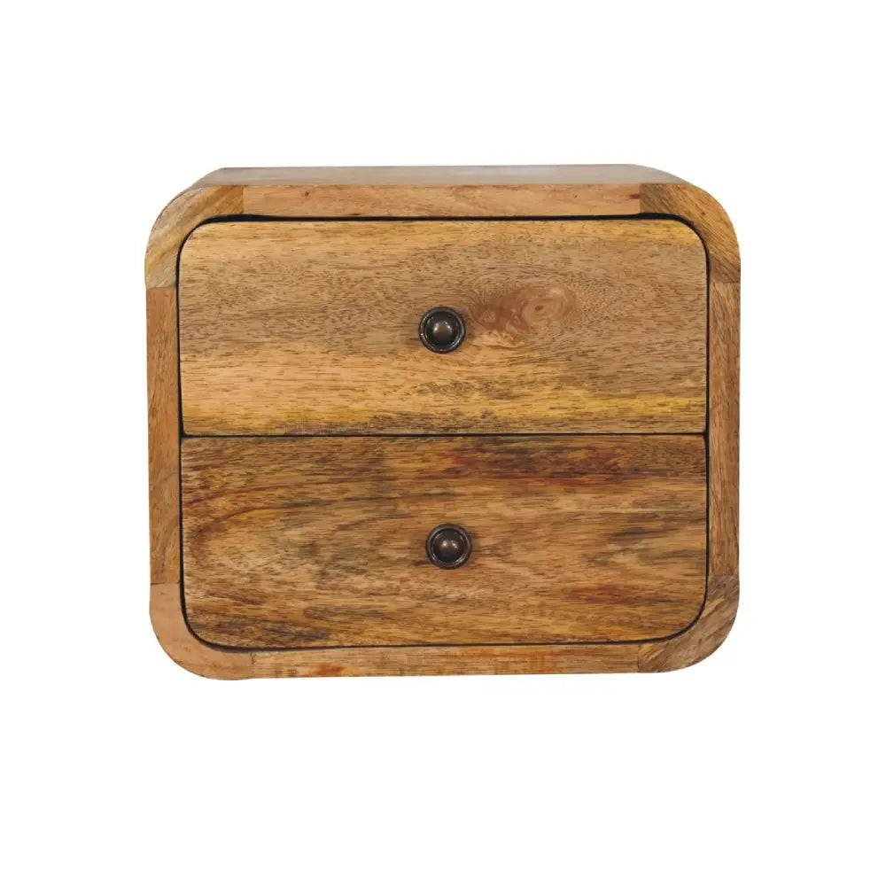 A rustic mini curve oak floating bedside with two drawers rounded corners natural wood grain and dark metal knobs