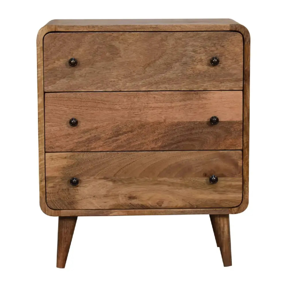 A polished silver knights armor suit displayed on a wooden stand next to a mini curved oak-ish chest luxury furniture for modern homes