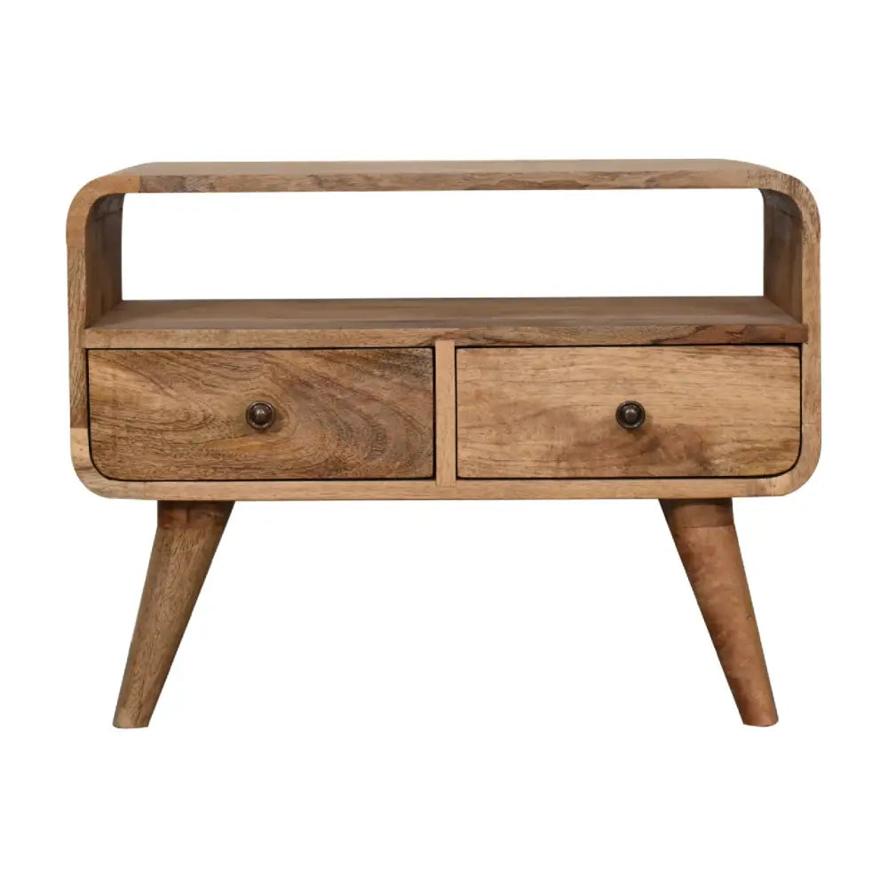 A mid-century modern mini curved oak media unit with two drawers tapered legs and dark metal knobs