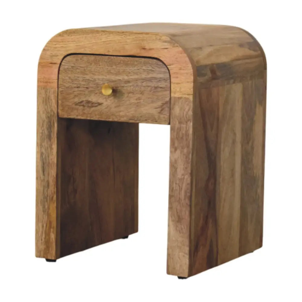 Mini darcy oak-ish nightstand with curved edges made of solid mango wood and a brass knob drawer showing wood grain