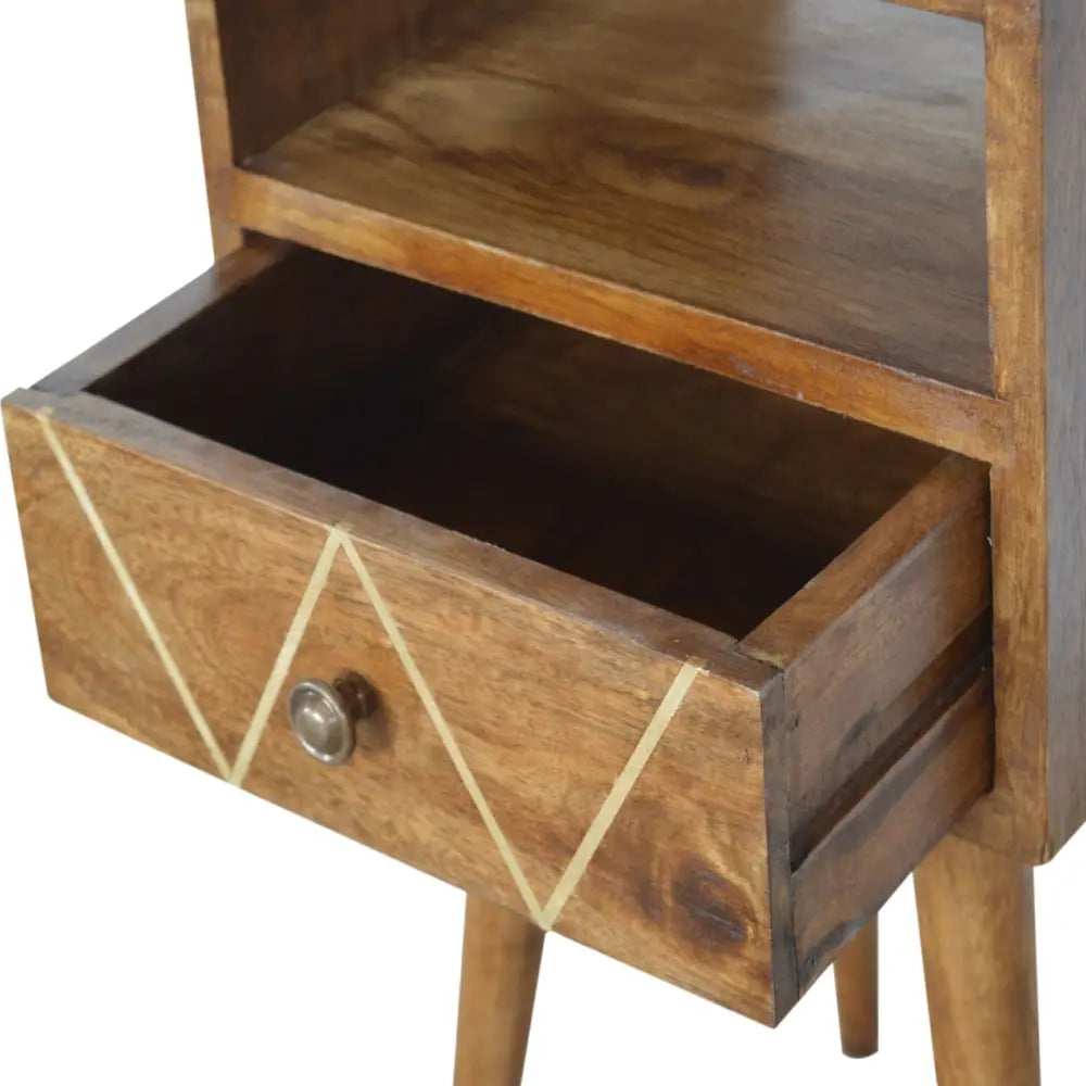 A rustic wooden mini geo brass bedside nightstand with a light geometric inlay and metallic knob drawer