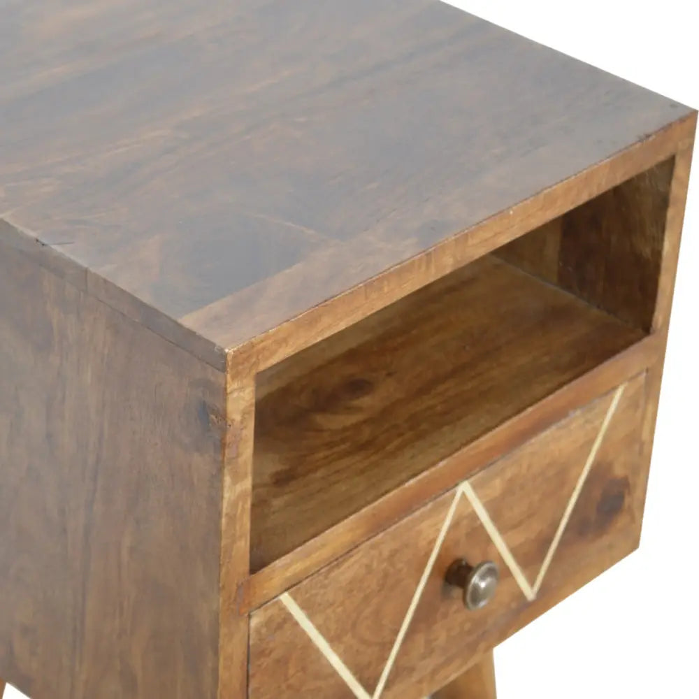 A rustic mini geo brass bedside nightstand with dark brown wood, white geometric inlay drawer, and metallic knob