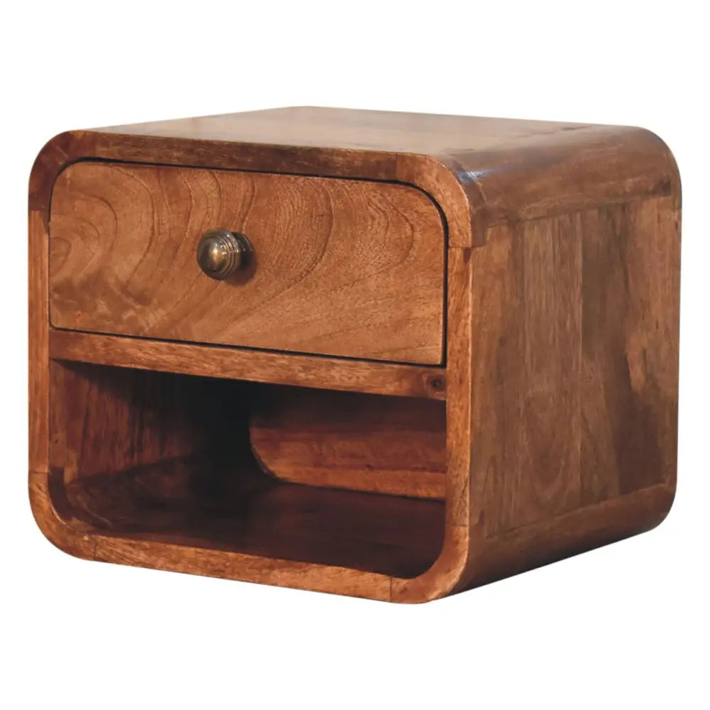 Mini honey caramel wall mounted bedside with warm-toned wood, single drawer, rounded edges, and open slot design