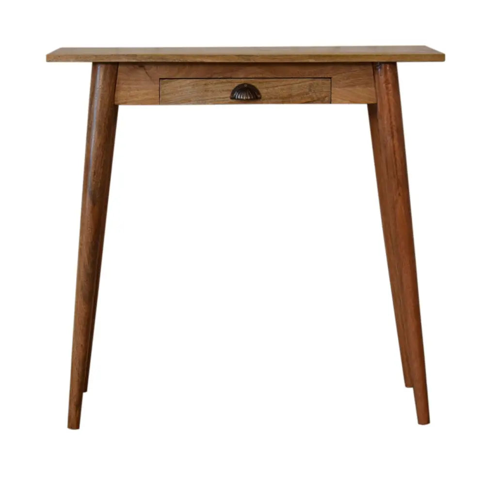 A mini nordic style writing desk with a sleek warm brown wood finish and tapered legs perfect for small spaces