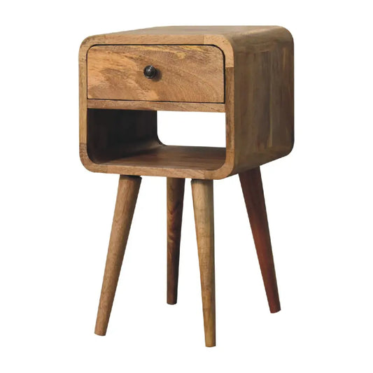 A mid-century modern wooden mini oak-ish curve lower bedside nightstand with a single drawer and tapered legs