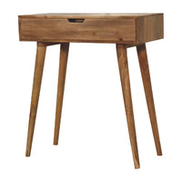 Mini oak dressing table with natural wood finish tapered legs and single drawer in a minimalist style