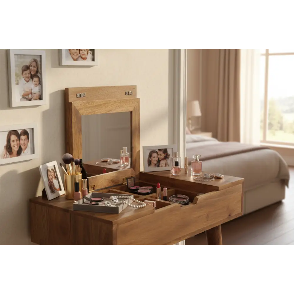 Light brown oak ish wooden mini dressing table with mirror and open drawers holding makeup items