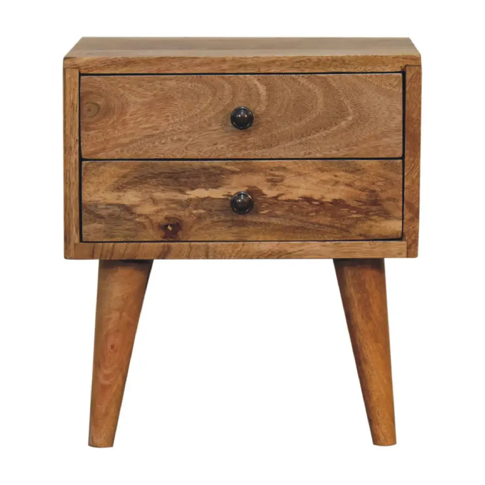 A rustic oak mini modern bedside with two drawers and black knobs perfect for luxury furniture for modern homes
