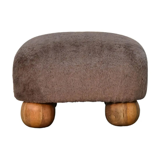 Mocha faux fur nordic footstool with brown faux fur upholstery and rounded wooden legs for cozy seating