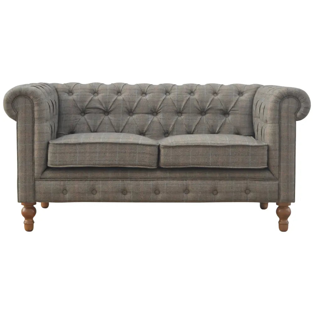 Gray multi tweed 2 seater chesterfield sofa with rolled arms and button tufting in tweed fabric