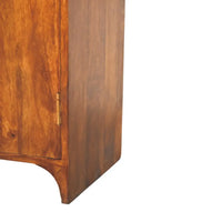 Newton chestnut cabinet made of warm-toned solid mango wood with smooth polished finish and visible grain patterns